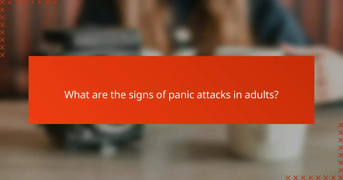 What are the signs of panic attacks in adults?